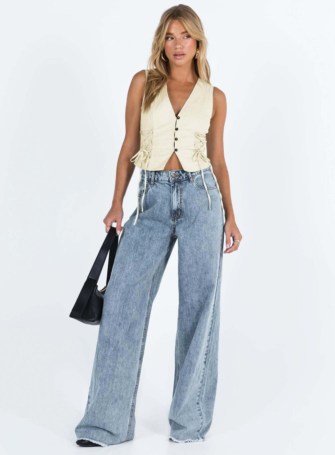 Dame modigt cropped-top med snøre detaljer og knap lukning Stilla