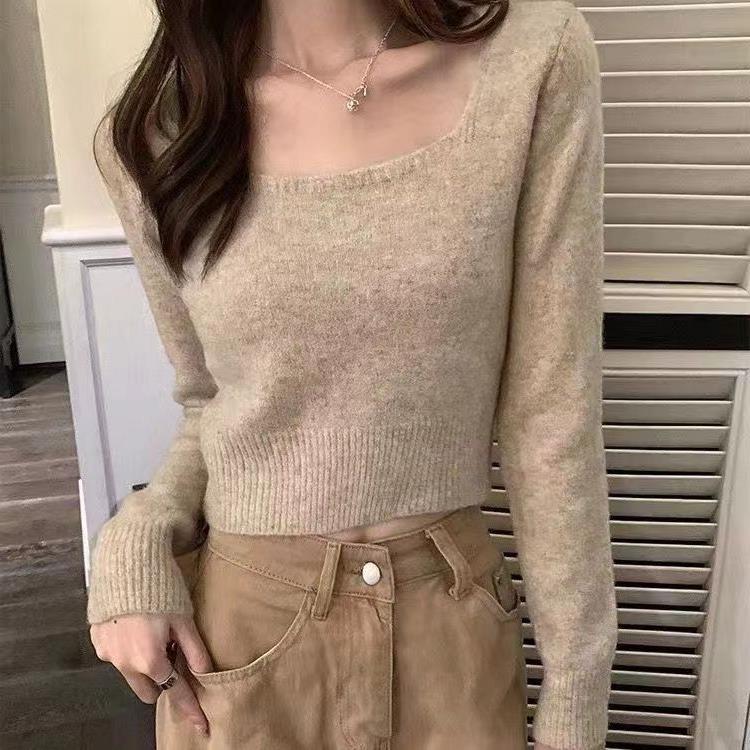Kvinders fashionable sweater med bred rund halsudskæring og fin tekstur Stilla