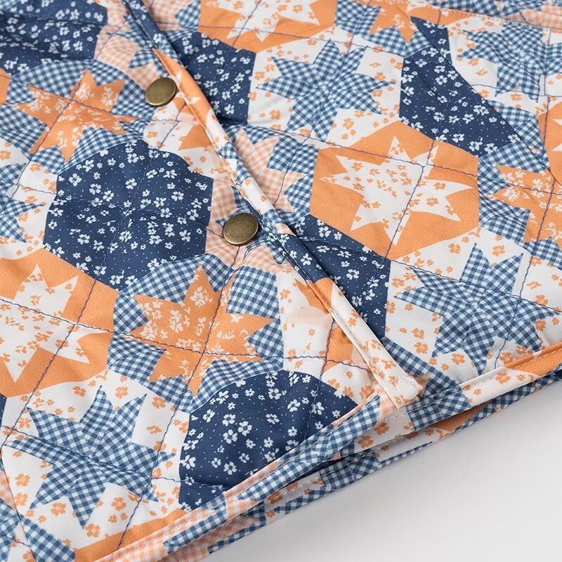 Kvinders mode quiltet jakke med blomsterdesign og praktiske lommer
