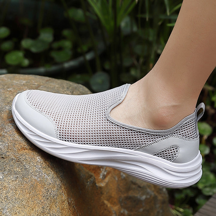 Herrer nan åndbar net-sportsko med slip-on form og stødabsorberende sål Skovae