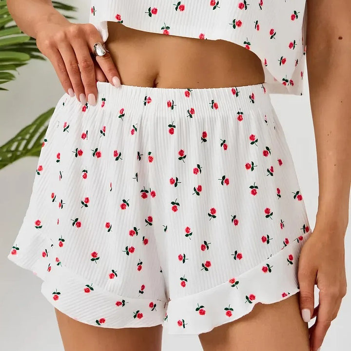 Dame let pyjamasæt med legende blomsterdesign og flæser Stilla