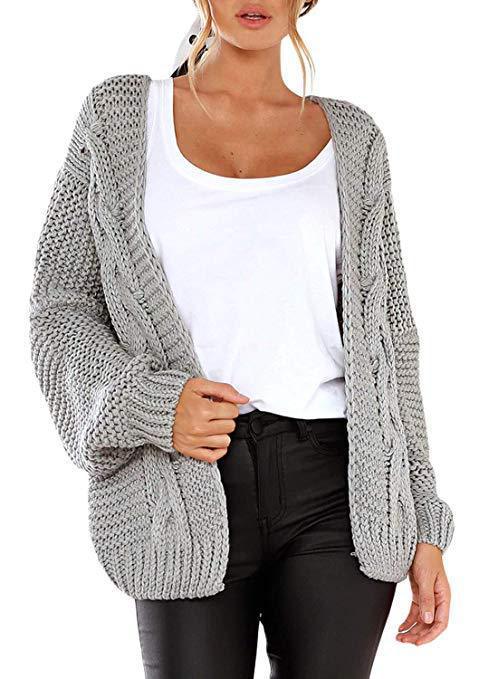 Kvinders chunky strikket cardigan med elegant kabelmønster og løs pasform Stilla