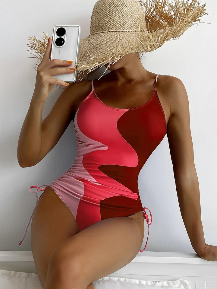 Dame heldragt badebadedragt med legende cut-outs og blomstret design Skovae