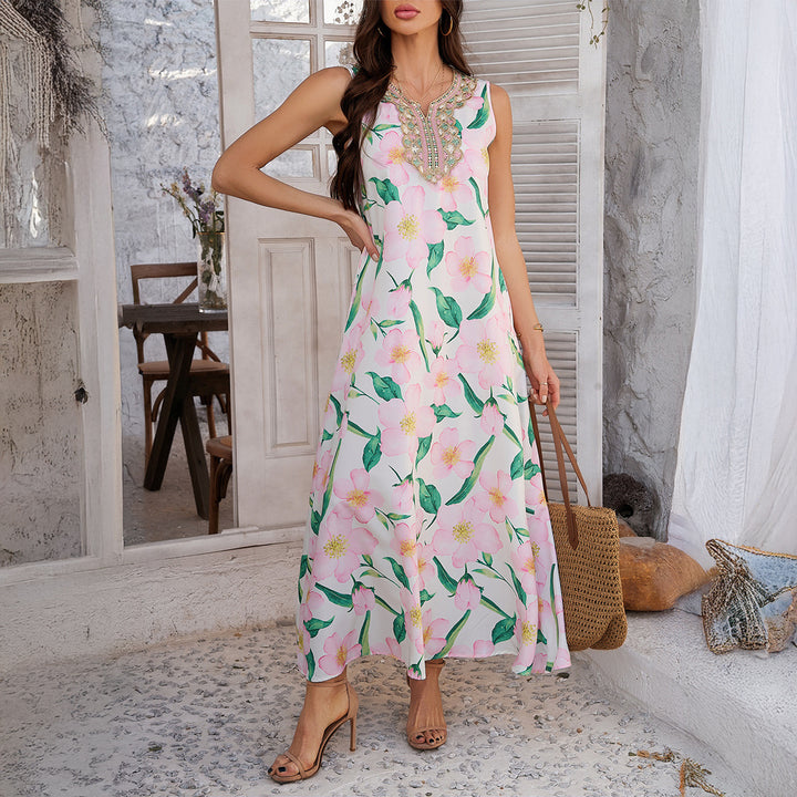 Dame Maxikjole med farverigt patchwork-design og dekadent halskrave Stilla