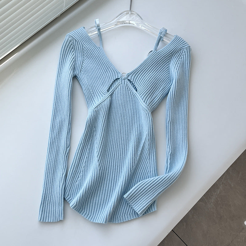 Dame strik top med raffineret design og cut-out detaljer Stilla