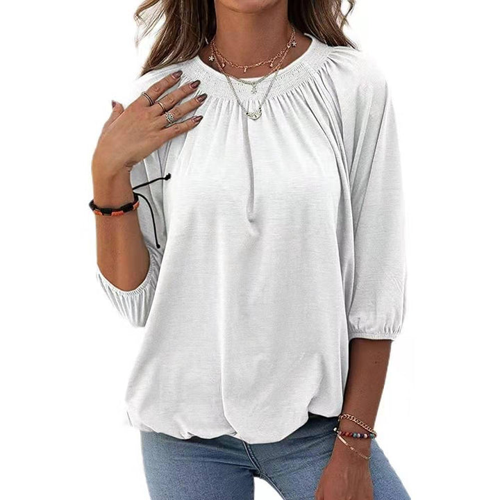 Dame afslappet bluse med casual snit og elastiske pufærmer Stilla