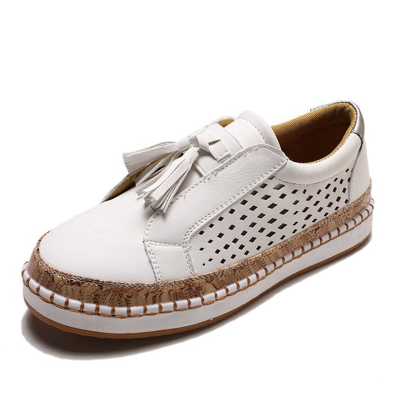 Dame nan perforeret Slip-On Sneaker med kvaster, kork-platform og dekorativ håndsyning Skovae