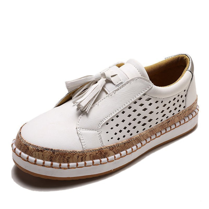 Dame nan perforeret Slip-On Sneaker med kvaster, kork-platform og dekorativ håndsyning Skovae