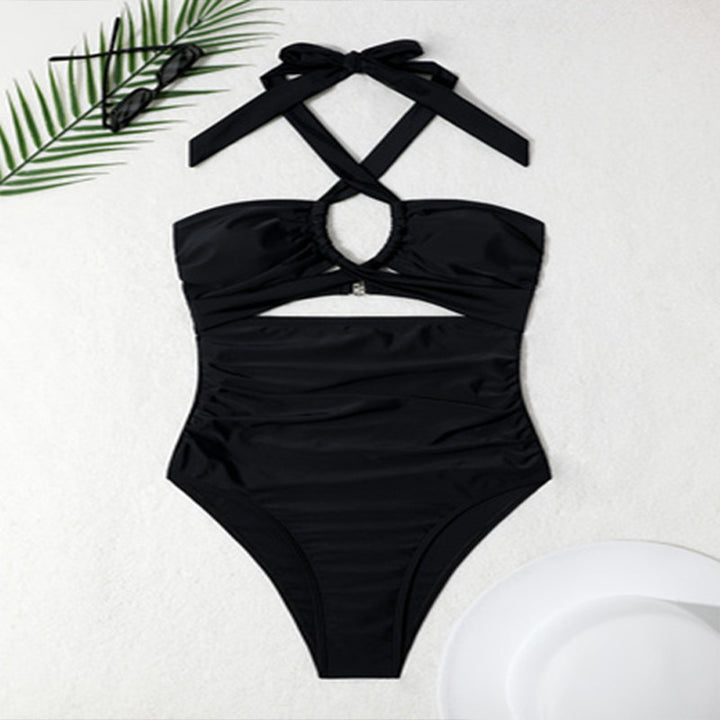 Dame heldragt badedragt med moderigtigt cut-out og raffineret krydsstroppedesign Skovae