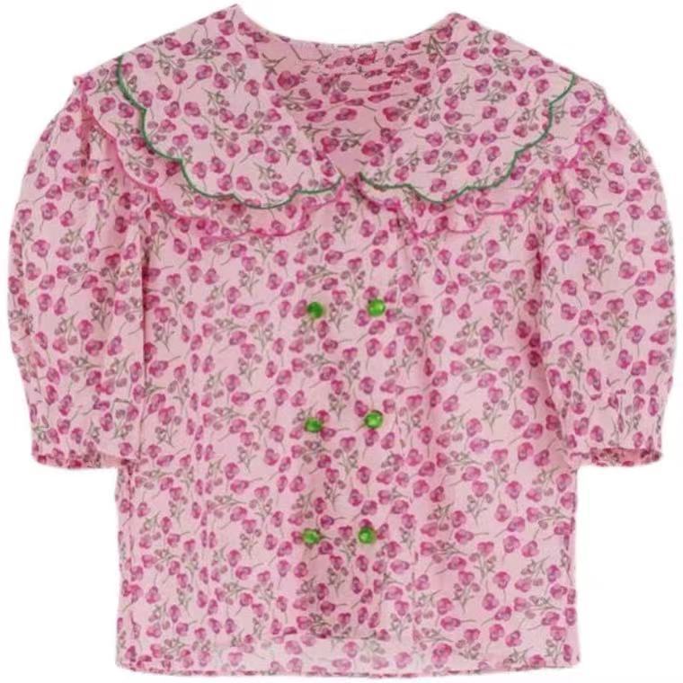 Damebluse med voluminøse puffærmer og blomsteretternet krave Stilla