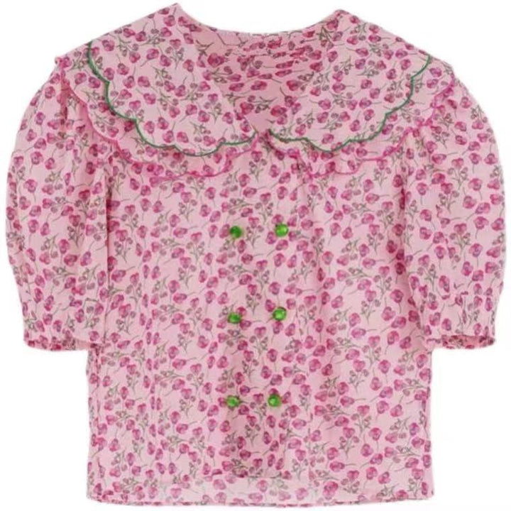 Damebluse med voluminøse puffærmer og blomsteretternet krave Stilla
