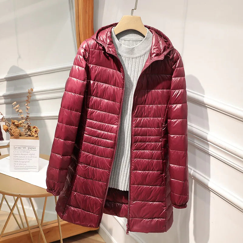 Stilla | Lang puffy jakke til kvinder med hætte