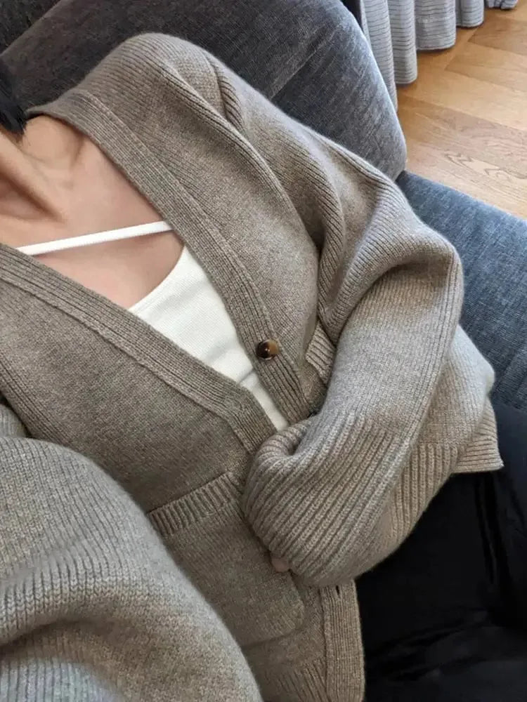 Stilla | Damestrikjakke med lange ærmer og knaplukning