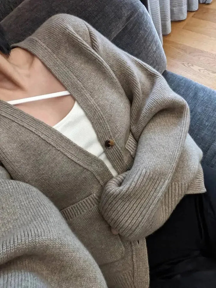 Stilla | Damestrikjakke med lange ærmer og knaplukning