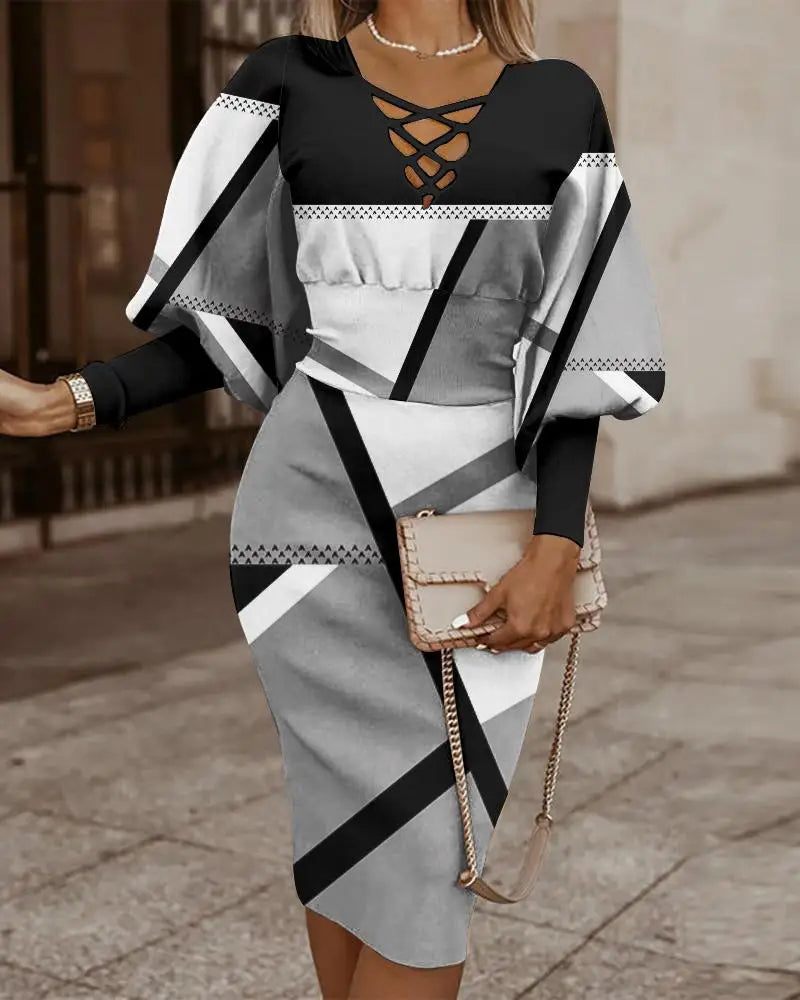 Stilla | Elegant Geometric Print Midi Dress til kvinder