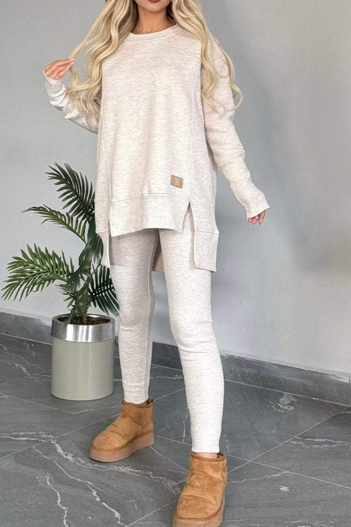 Stilla | Sweatshirt og Skinny Jeans Sæt Med Slids og Asymmetrisk Kant