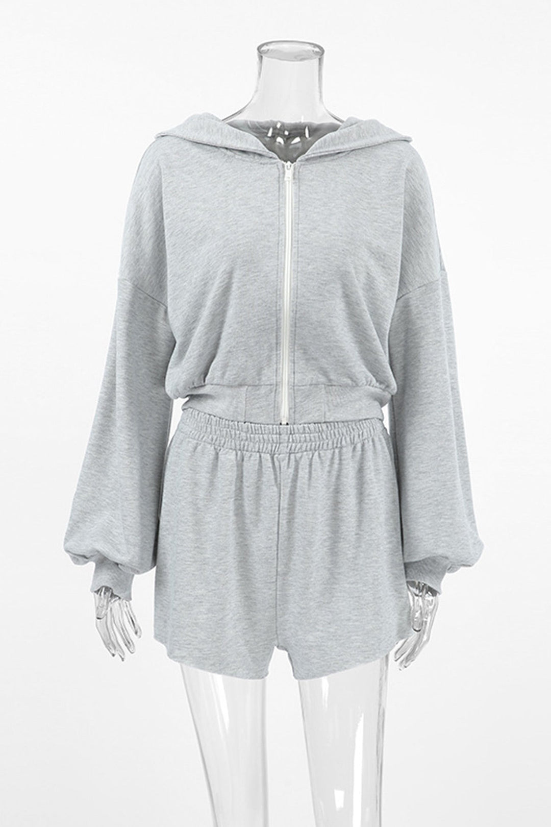 Stilla | En-del med shorts og kortærmet hættebluse Uni
