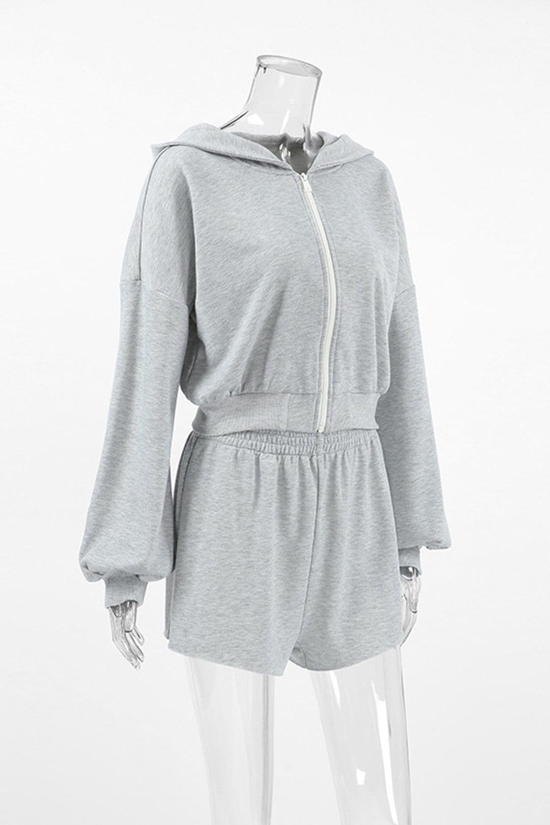 Stilla | En-del med shorts og kortærmet hættebluse Uni
