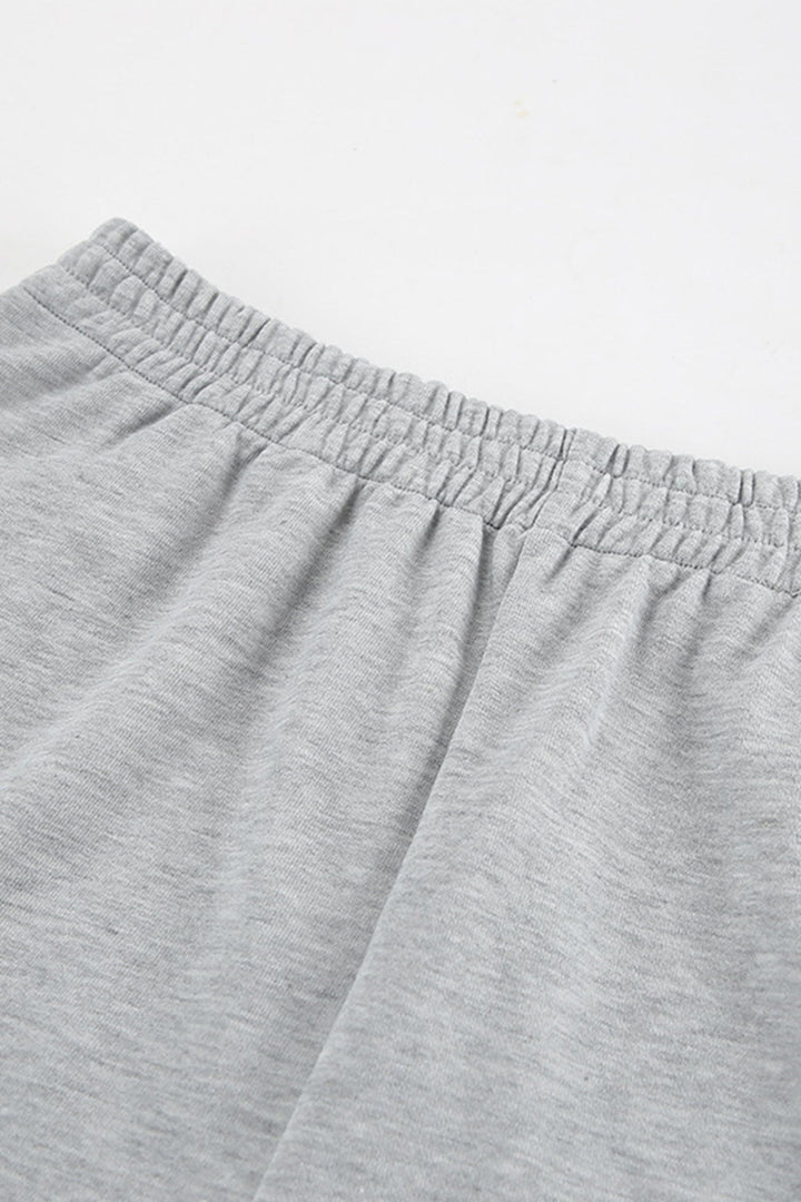 Stilla | En-del med shorts og kortærmet hættebluse Uni