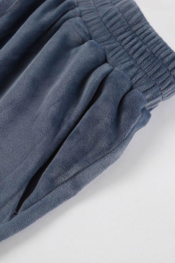 Stilla | En-del med shorts og kortærmet hættebluse Uni