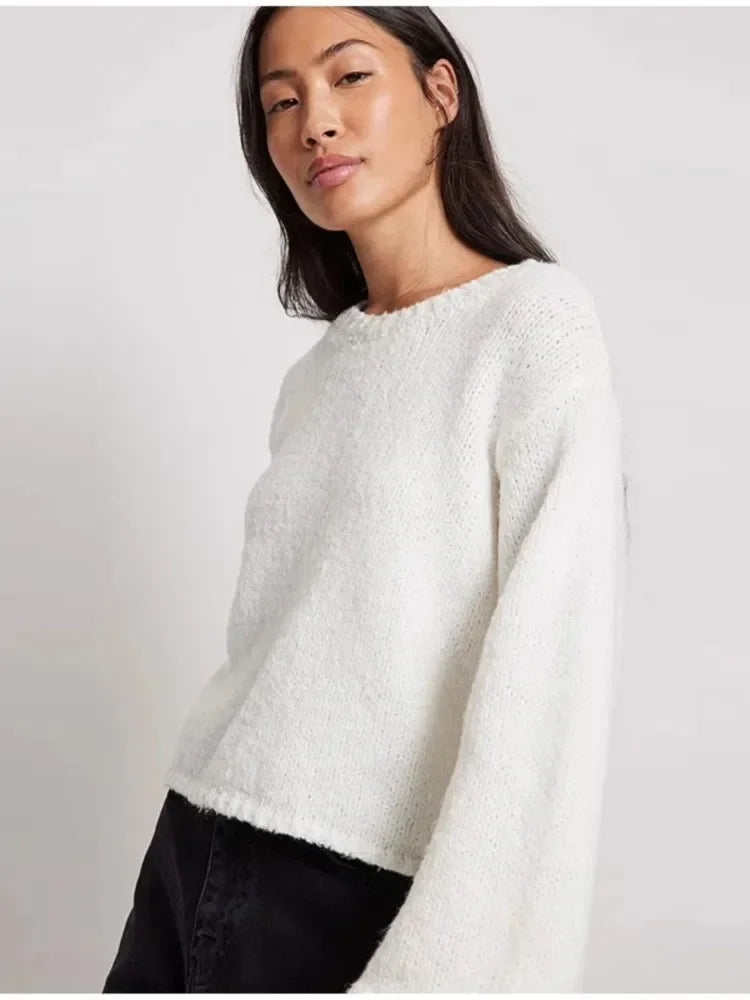 Stilla | Cropped top med lange ærmer og ryggsplit