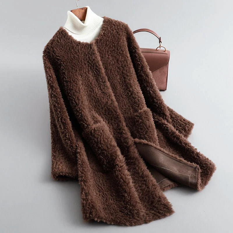 Stilla | Faux Shearling Midikabou med Rundhalssnit