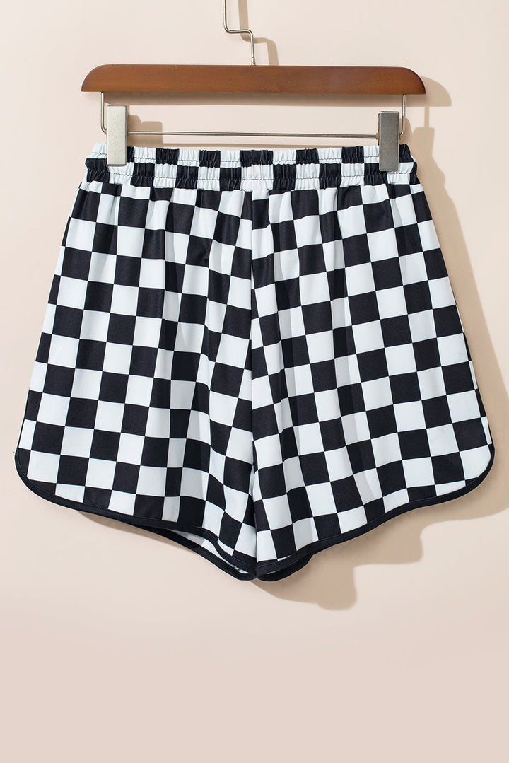 Stilla | Rutede shorts med lommer
