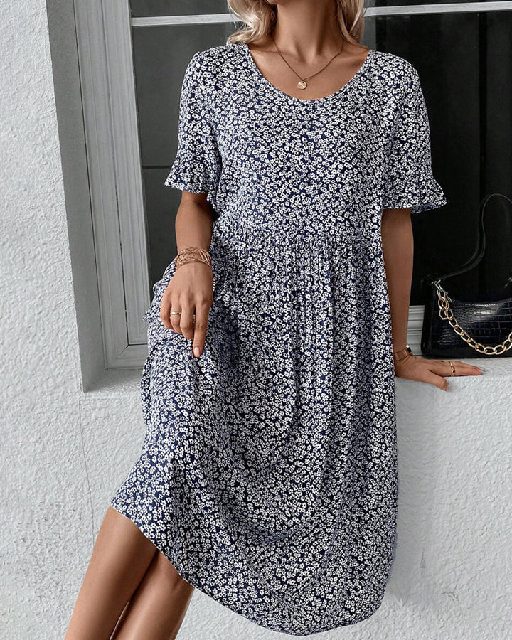 Stilla | Elegant Midi-Kjole med Blomster