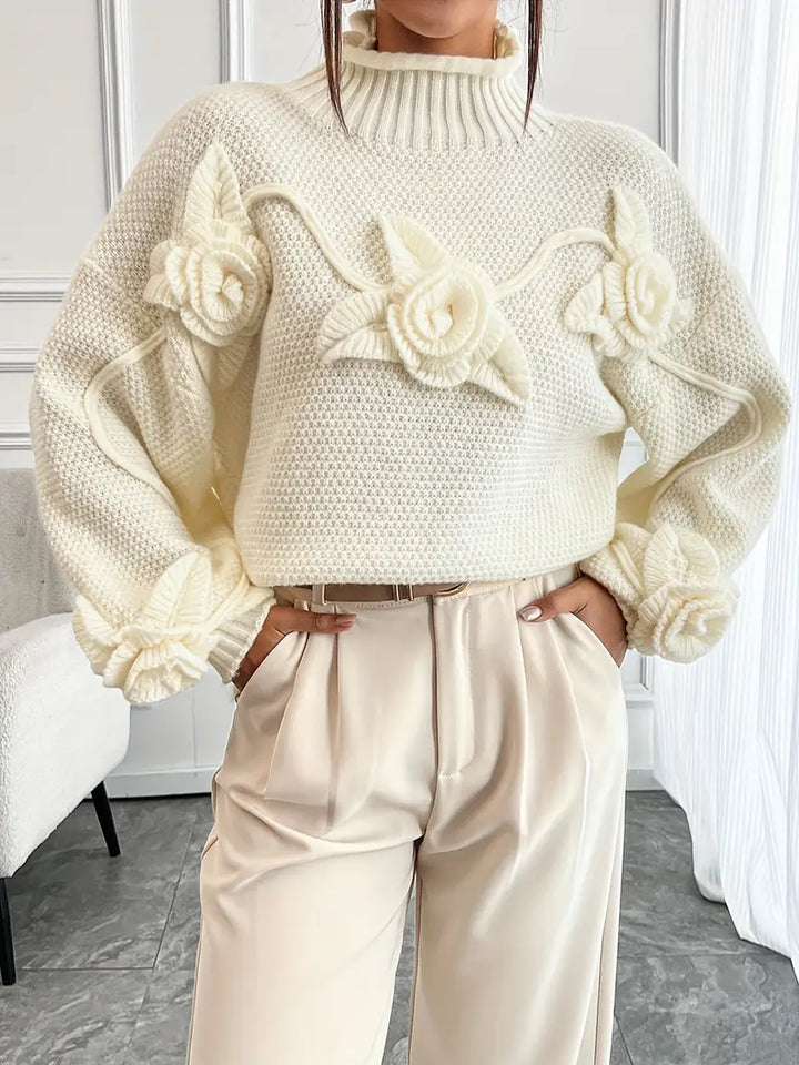 Stilla | Rullekrave strikbluse med blomster