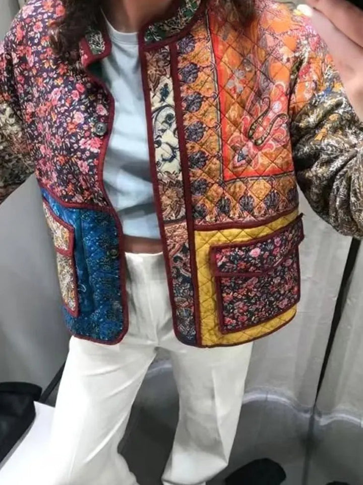Skovae | Frakke med blomstertryk og patchwork-lommer