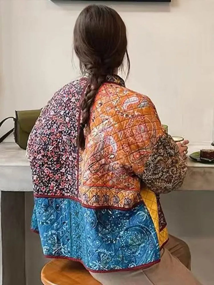 Skovae | Frakke med blomstertryk og patchwork-lommer