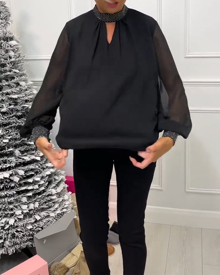 Stilla | Bluse med ensfarvet stående krave og patchwork udskæring