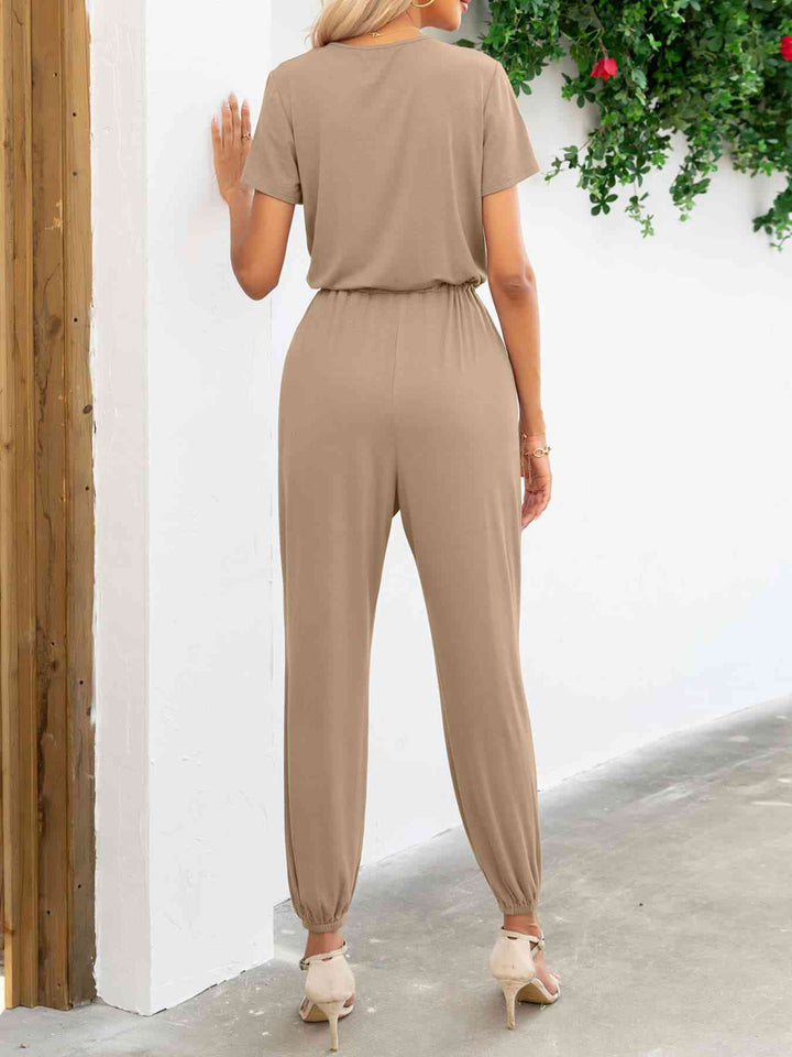 Stilla | Ærme V-hals Jumpsuit Med Lommer