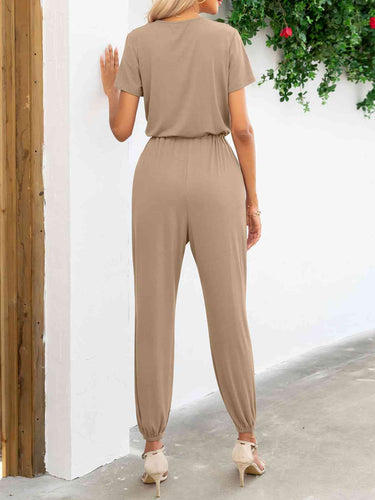 Stilla | Ærme V-hals Jumpsuit Med Lommer