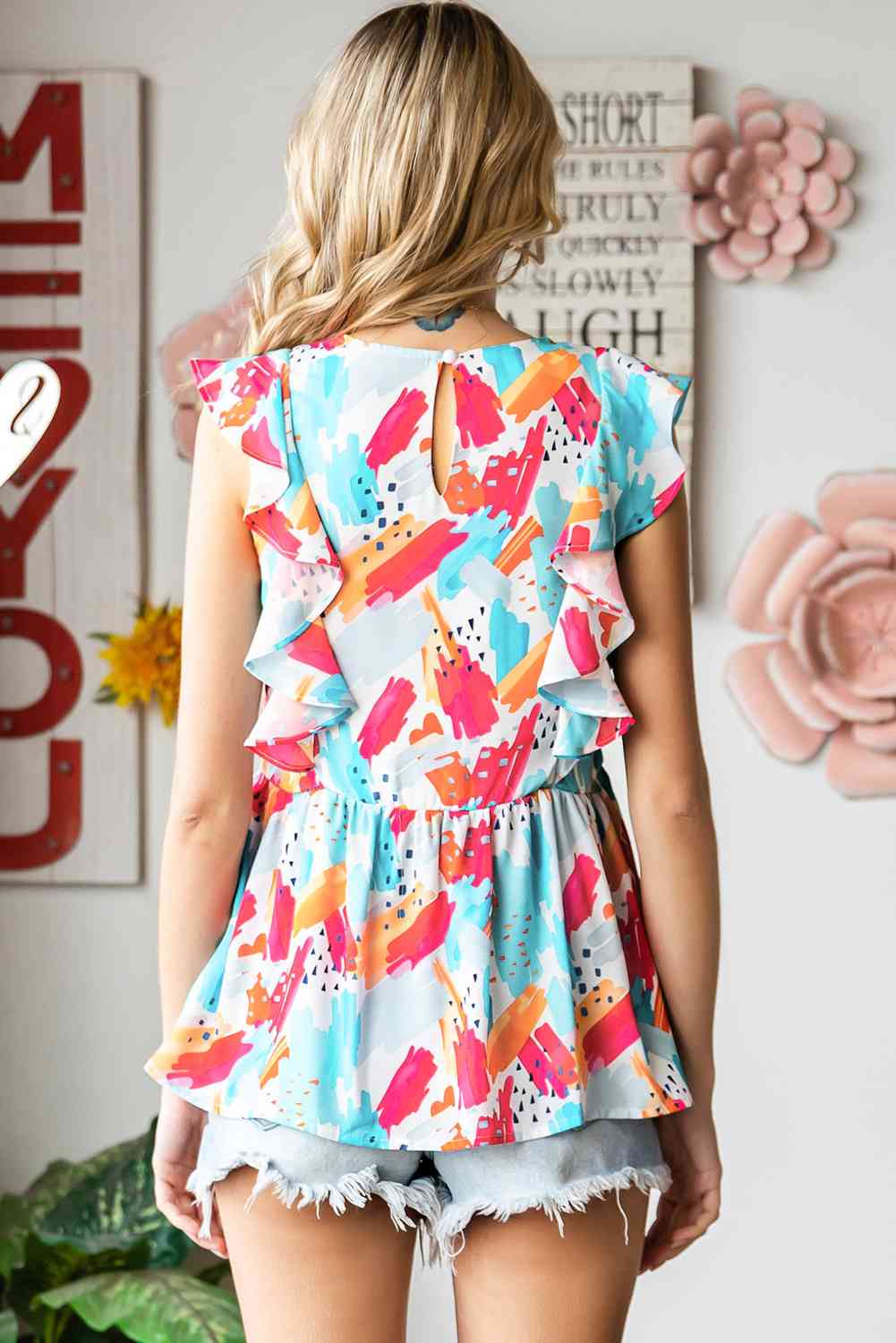 Stilla | Rund Hals Ruffle Peplum Top