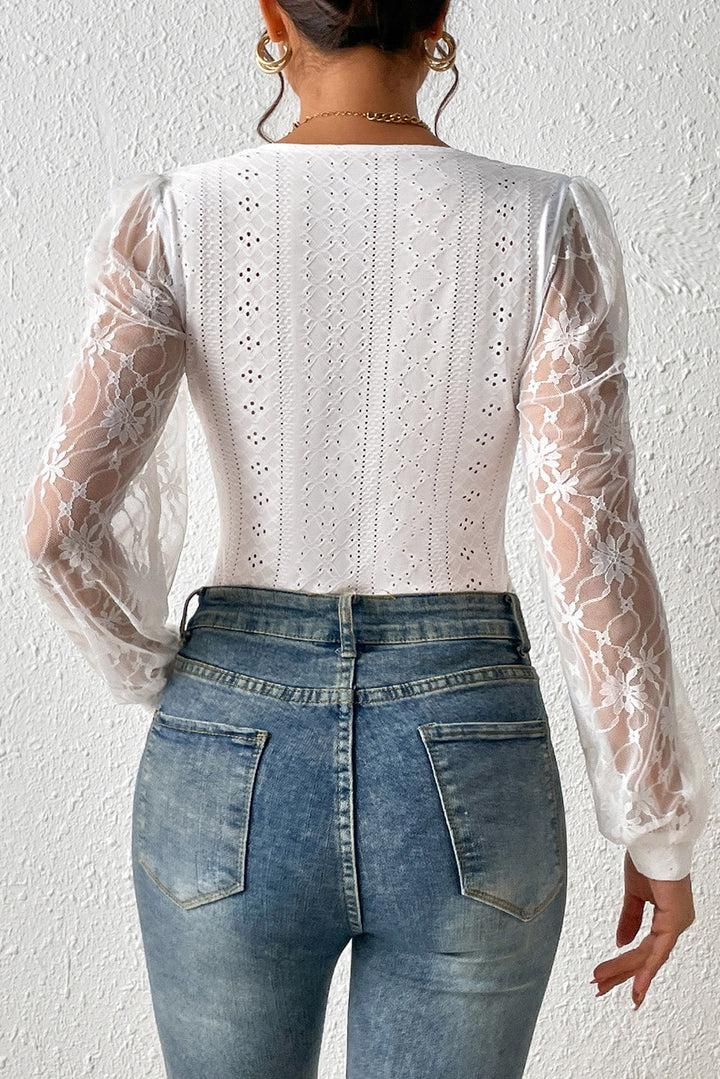 Stilla | Spids-langærmet-bodysuit