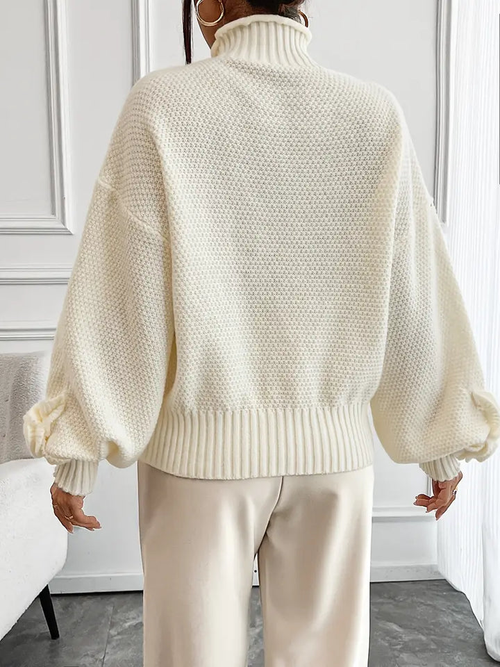 Stilla | Rullekrave strikbluse med blomster