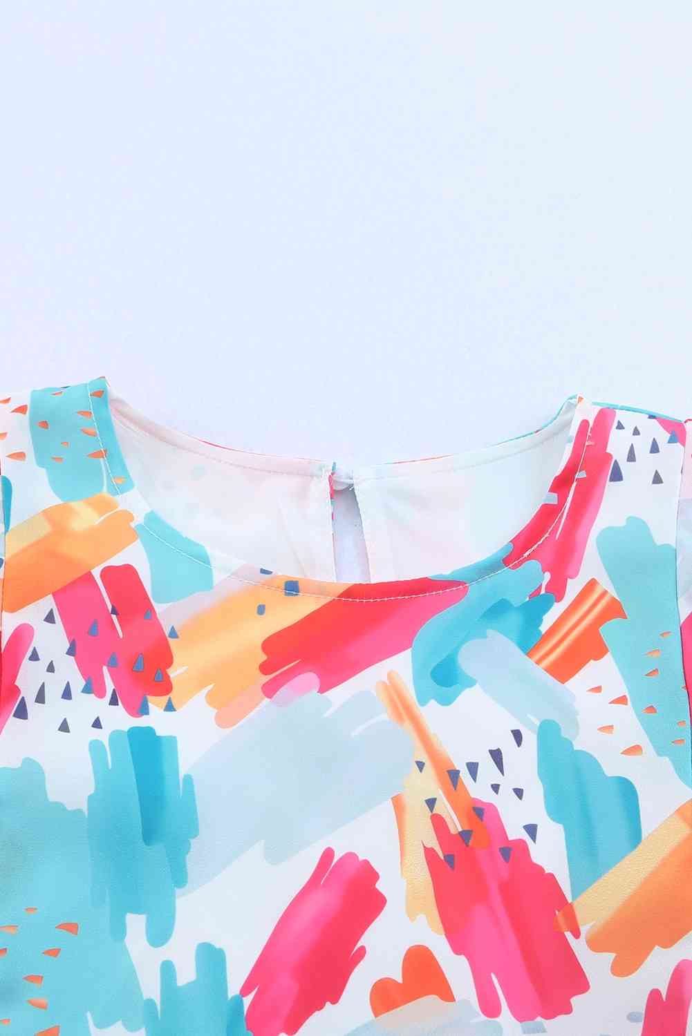Stilla | Rund Hals Ruffle Peplum Top