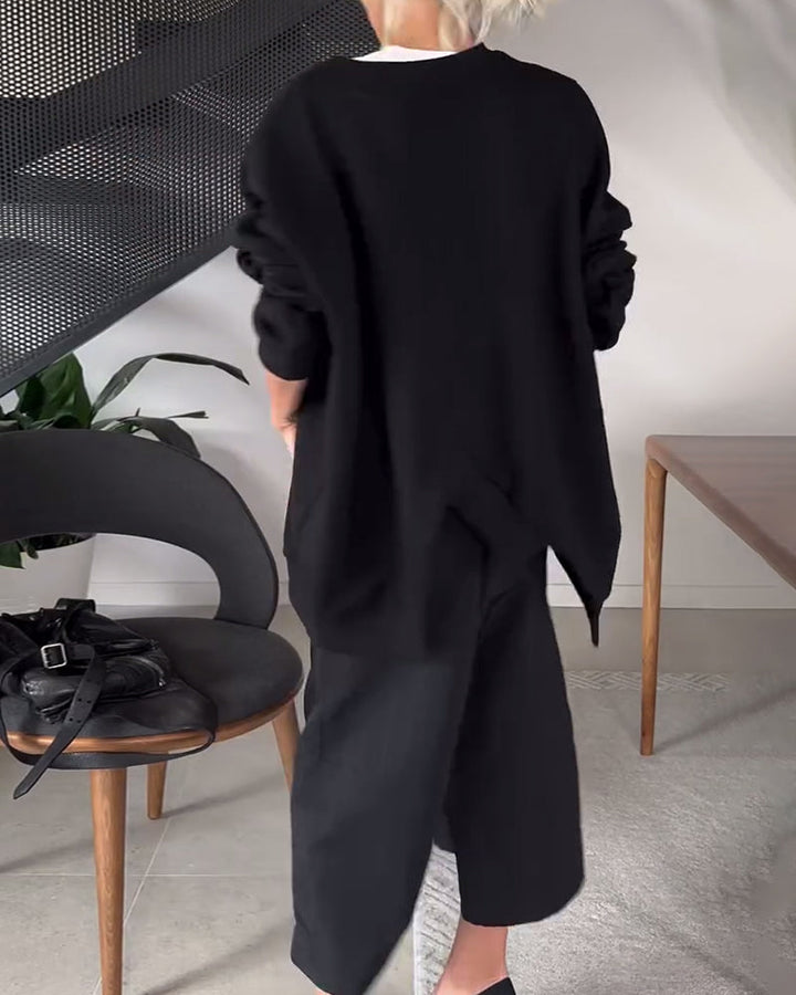 Stilla | Sweatshirt med rund halsudskæring og slids i ensfarvet