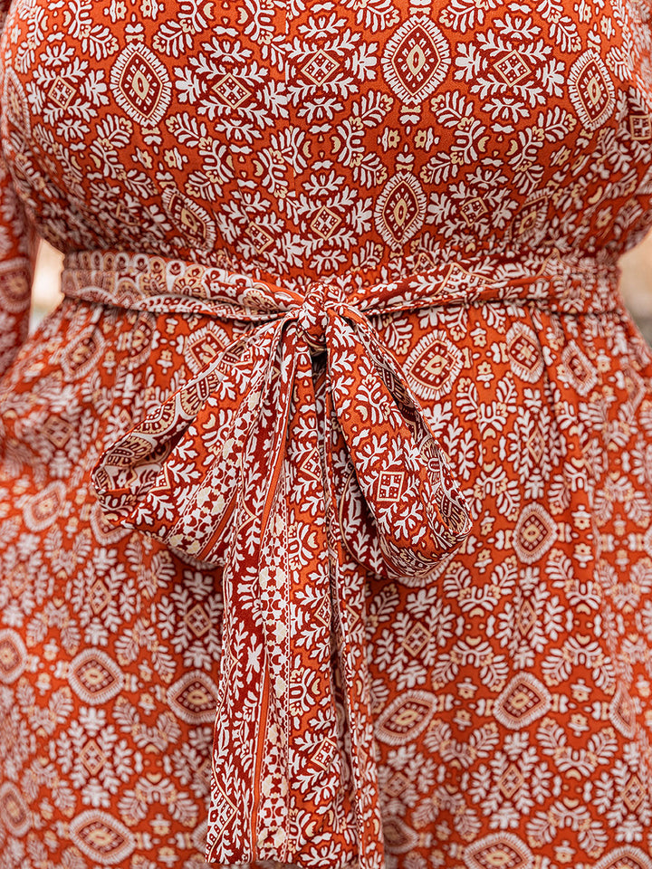 Stilla | Størrelse Trykt V-hals Binde Front Ballon Ærme Jumpsuit