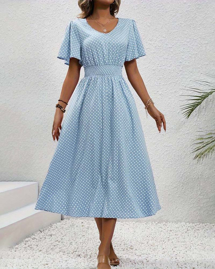 Stilla | Elegant Taljekjole med Prikket Print og Sommerfugleærmer