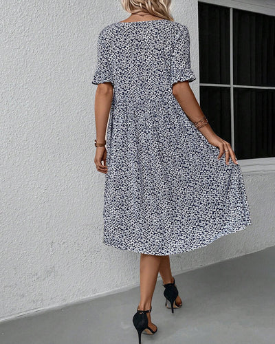 Stilla | Elegant Midi-Kjole med Blomster
