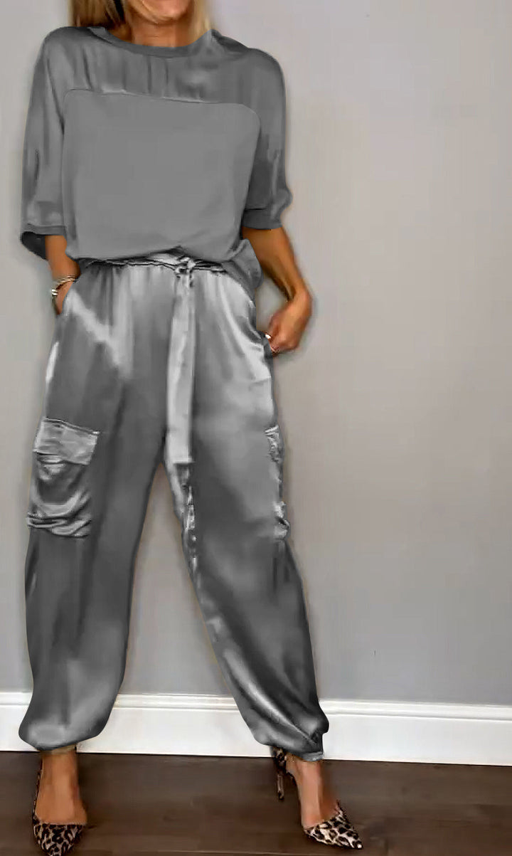 Stilla | Skinnerende satin-outfit