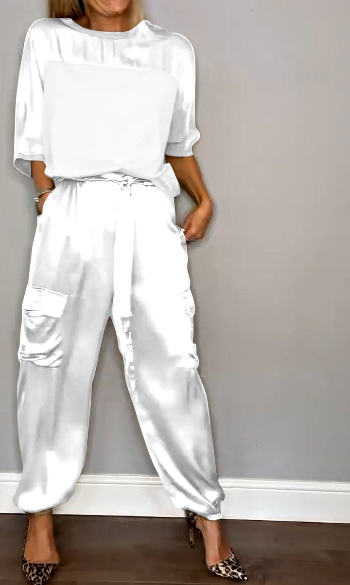 Stilla | Skinnerende satin-outfit