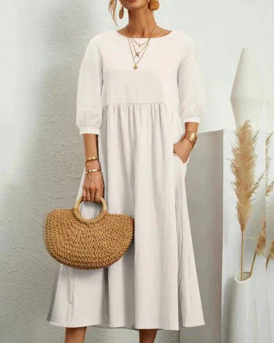 Stilla | Ensfarvet kjole med 3/4 ærmer