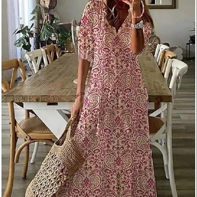 Skovae | Maxikjole med halvhævede ærmer og V-udskæring med blomsterprint
